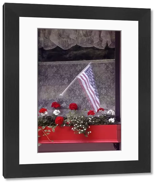 American flag and flower box