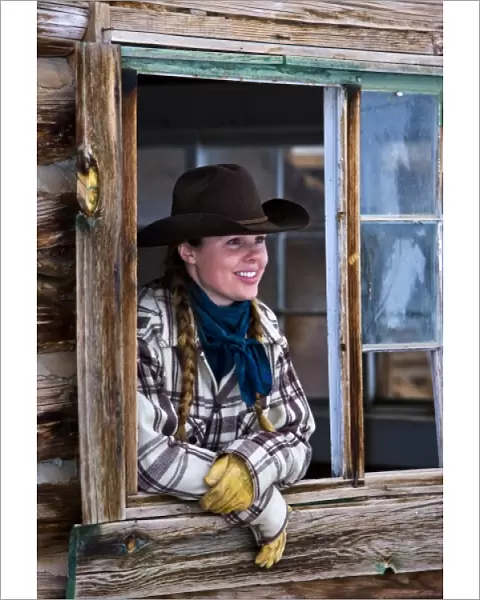 Cowgirl hanging out around the bunk house on The Hideout Ranch in Shell Wyoming