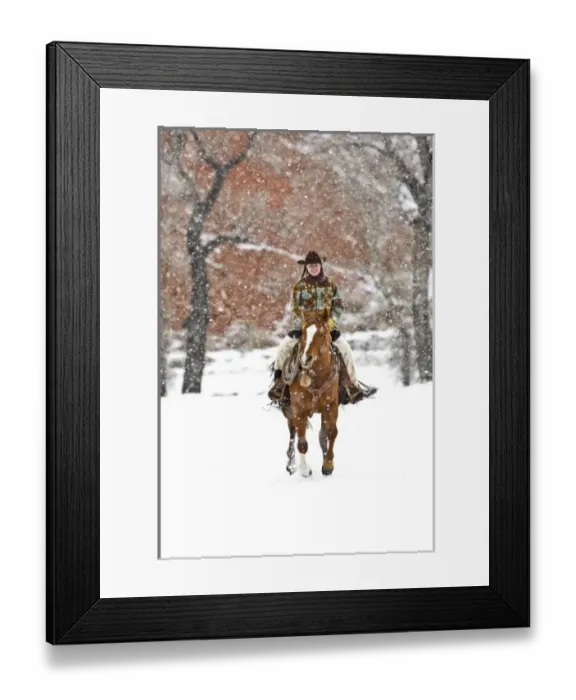 Framed Print : Cowgirl riding a horse on the range on The Hideout Ranch in Shell Wyoming