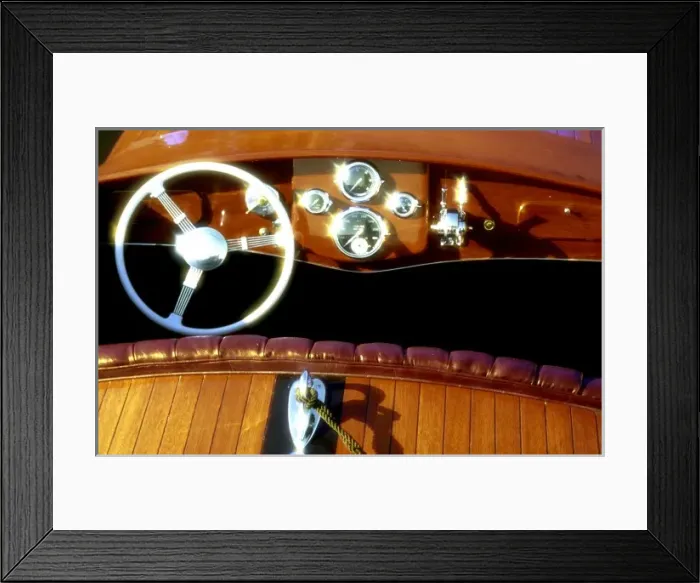 Framed Print : Finished woodwork on a wooden boat sparkles in the sun
