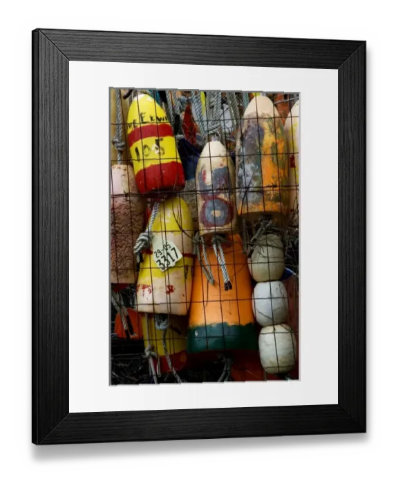 Framed Print : Stock photo of bouys hung on a fence at a shipyard Framed Print : Stock photo of bouys hung on a fence at a shipyard