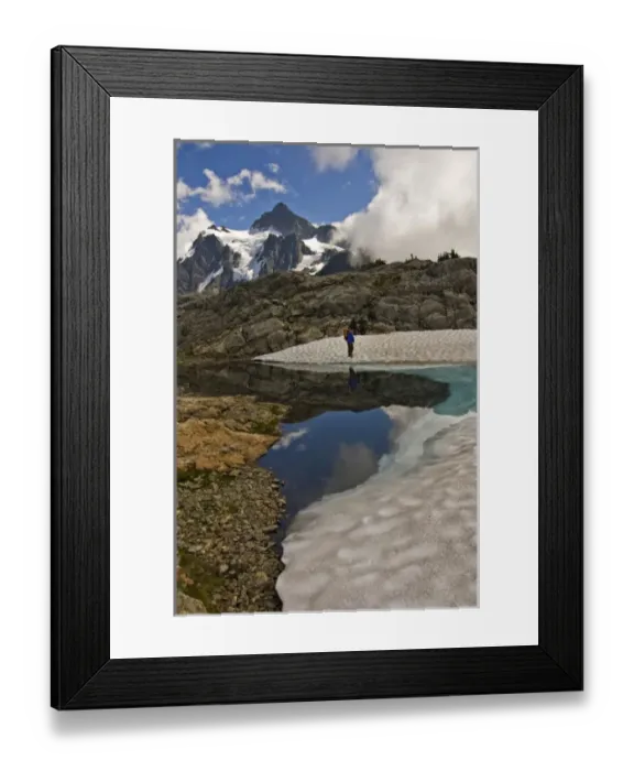 Framed Print : USA, Washington, North Cascades. A female hiker near Mt. Shuksan and the Mt. Baker Ski Area