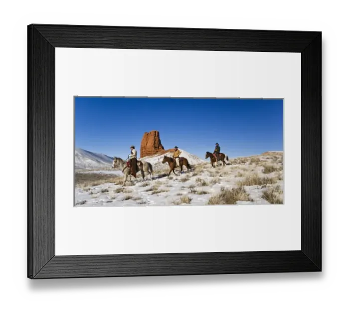 Framed Print : Cowgirl and cowboy with horses on the range on The Hideout Ranch in Shell Wyoming Framed Print : Cowgirl and cowboy with horses on the range on The Hideout Ranch in Shell Wyoming