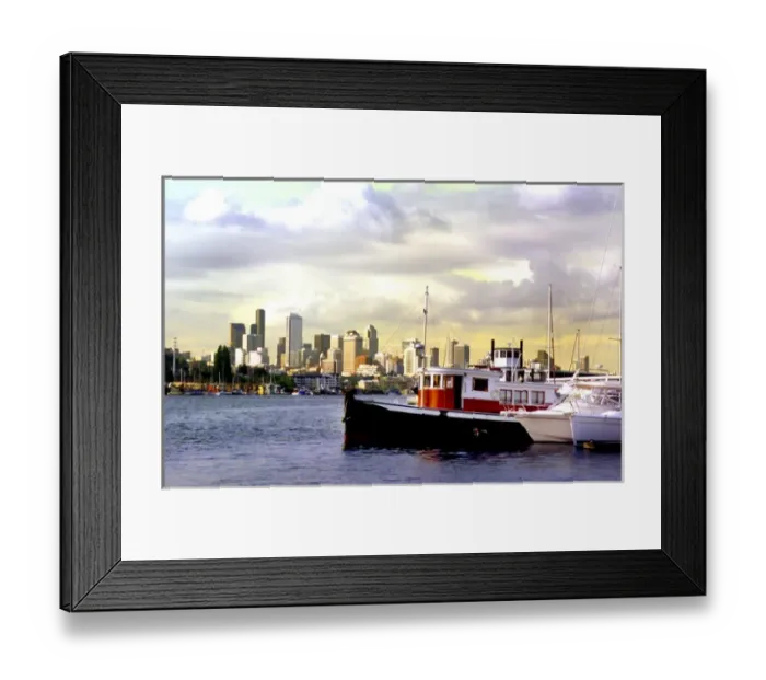 Framed Print : Seattle skyline frames a wooden boat on Lake Union