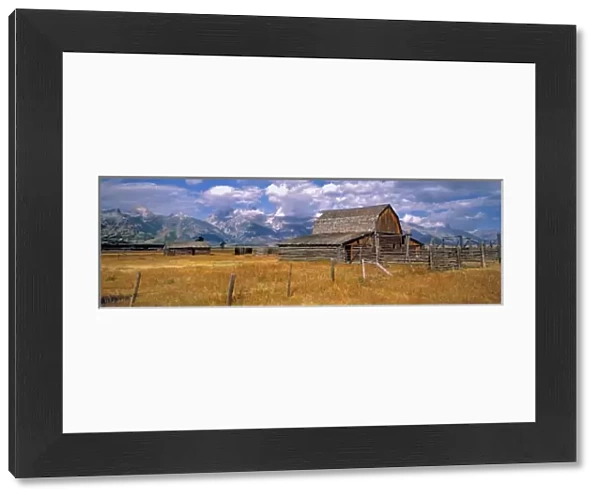 USA, Wyoming, Grand Teton NP. An old wooden barn is part of a homestead in Grand
