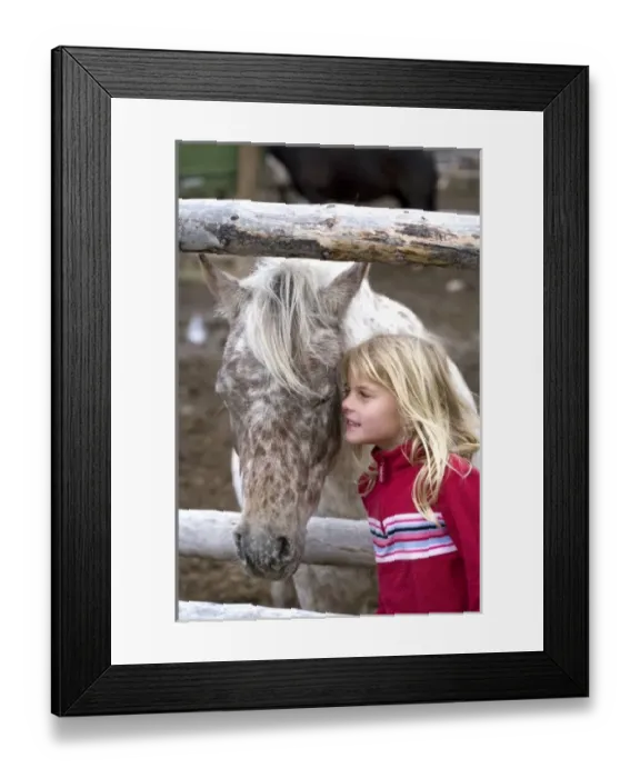Framed Print : USA. Wyoming. Grand Tetons National Park. Young girl looks a spotted pony in Framed Print : USA. Wyoming. Grand Tetons National Park. Young girl looks a spotted pony in