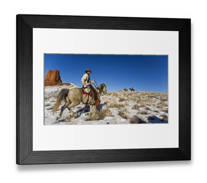 Framed Print : Cowboy with horses on the range on The Hideout Ranch in Shell Wyoming