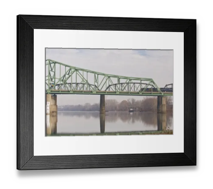 Framed Print : USA, WV, Parkersburg. CSX freight train on trestle just beyond Parkersburg-Belpre Framed Print : USA, WV, Parkersburg. CSX freight train on trestle just beyond Parkersburg-Belpre