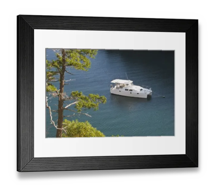Framed Print : USA, WA, San Juan Islands. Motor catamaran moored in Snoring Bay of Sucia Island State Park Framed Print : USA, WA, San Juan Islands. Motor catamaran moored in Snoring Bay of Sucia Island State Park