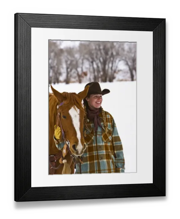 Framed Print : Cowgirl with a horse on the range on The Hideout Ranch in Shell Wyoming
