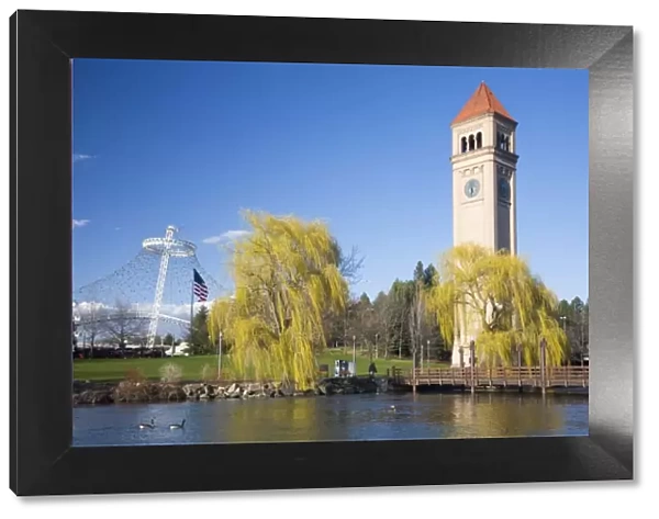 WA, Spokane, Riverfront Park, view across the Spokane River, the Clock Tower and the U