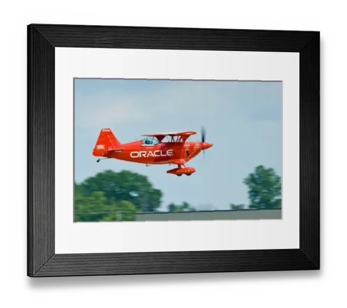 Framed Print : Oracle Challenger II Stunt Biplane flying