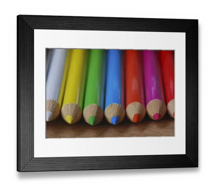 Framed Print : USA, Row of multicolored colored pencils lay on table