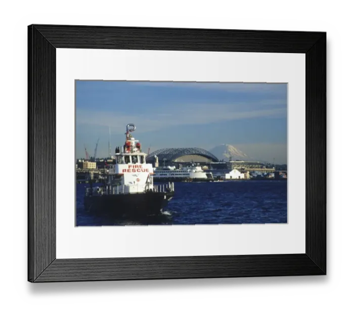 Framed Print : USA, Washington, Seattle, Elliott Bay. Fire rescue boat in Elliott Bay with Safeco Field and Mt Framed Print : USA, Washington, Seattle, Elliott Bay. Fire rescue boat in Elliott Bay with Safeco Field and Mt