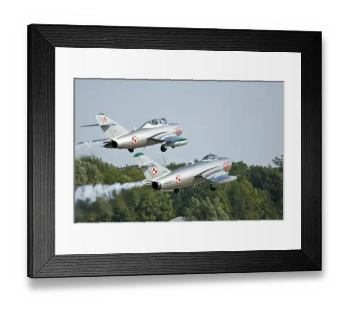 Framed Print : Russian MIG 15 (top) and MIG 17 (bottom) with Polish markings at Oshkosh 2006 Framed Print : Russian MIG 15 (top) and MIG 17 (bottom) with Polish markings at Oshkosh 2006