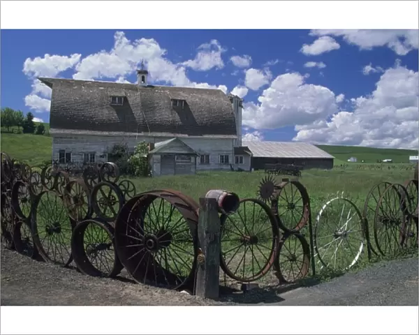 WA, Whitman County; Uniontown, wheel fence and barn