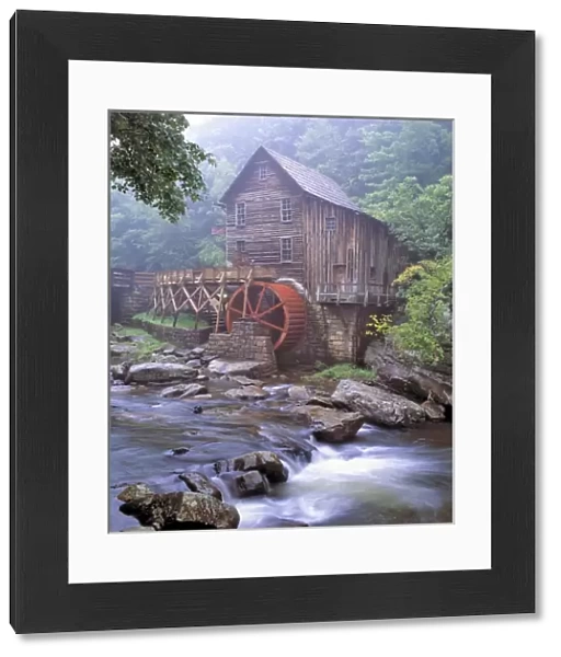 USA, West Virginia, Babcock SP. A ghostly fog clings to the Glade Creek Grist Mill