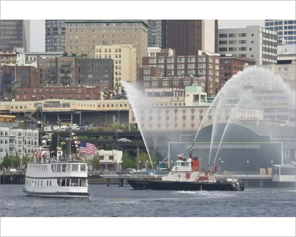 Tugboat races; historic steamboat Virginia V; fireboat Chief Sealth with monitor display