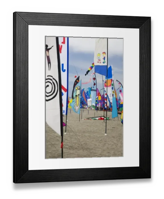Framed Print : WA, Long Beach, International Kite Festival, colorful banners