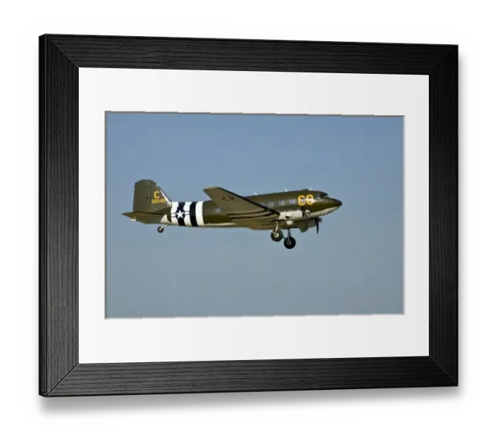Framed Print : Douglass DC-3  /  C-47 C-8 with D-Day Invasion Stripes in the sky