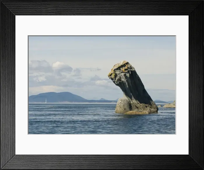 Framed Print : USA, WA, San Juan Islands. Dramatic sandstone pillar carved by wind and wave action Framed Print : USA, WA, San Juan Islands. Dramatic sandstone pillar carved by wind and wave action