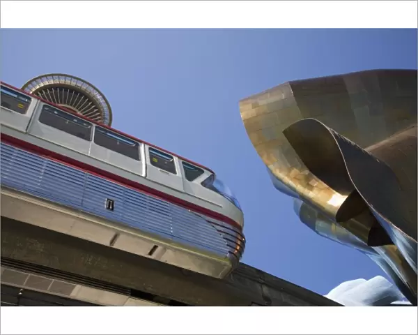 WA, Seattle, Seattle Center, Monorail with the Space Needle and Experience Music Project