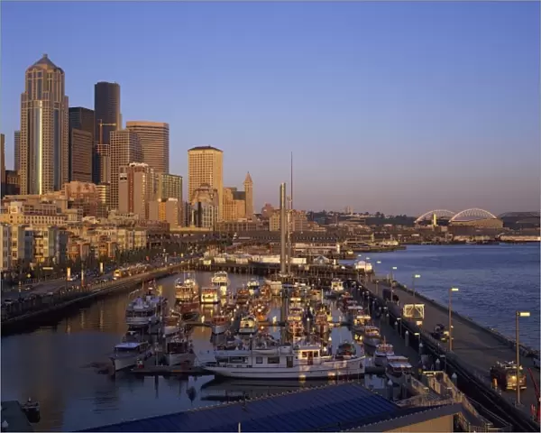 Seattle at Dusk. classic yachts fill the Bell Town Marina. Seattle, WA