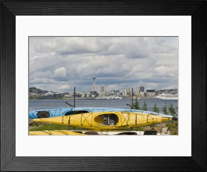 Framed Print : US, WA, Seattle. Kayaks on racks in West Seattle frame the downtown Seattle skyline Framed Print : US, WA, Seattle. Kayaks on racks in West Seattle frame the downtown Seattle skyline