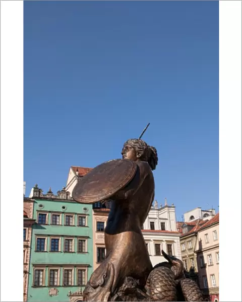 Bronze statue in middle of Old Town main square, Warsaw, Poland