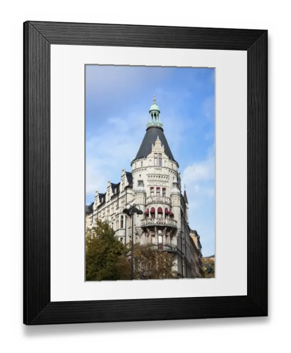 Framed Print : Stockholm, Sweden - Low angle view of an old world building with a spire Framed Print : Stockholm, Sweden - Low angle view of an old world building with a spire