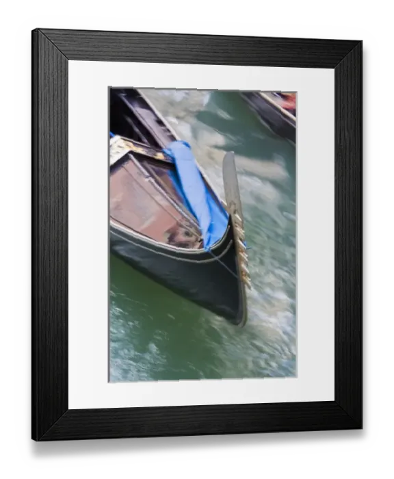 Framed Print : Italy, Venice, Grand Canal, Bow of Gondola traveling the Grand Canal Framed Print : Italy, Venice, Grand Canal, Bow of Gondola traveling the Grand Canal