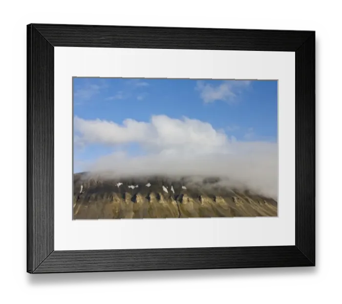 Framed Print : Norway, Svalbard, Spitsbergen Island, Setting sun lights clouds above eroded cliffs Framed Print : Norway, Svalbard, Spitsbergen Island, Setting sun lights clouds above eroded cliffs