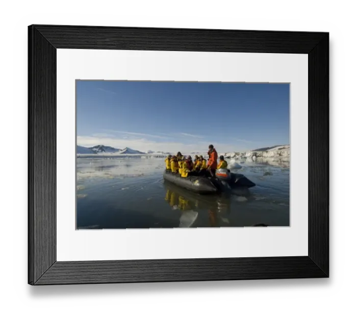 Framed Print : Passengers of zodiac enjoy cruising at Hornsund Fiord, on the western side of Framed Print : Passengers of zodiac enjoy cruising at Hornsund Fiord, on the western side of