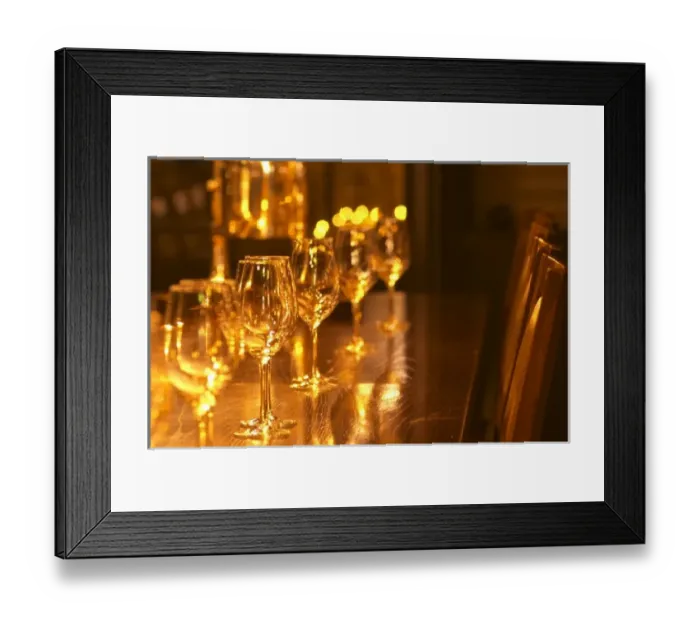 Framed Print : In a wine tasting room glasses lined up on a dark wooden table in golden light, Ulriksdal Framed Print : In a wine tasting room glasses lined up on a dark wooden table in golden light, Ulriksdal