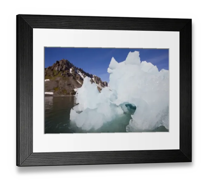 Framed Print : Norway, Svalbard, Spitsbergen Island, Melting iceberg floating beneath mountain peaks Framed Print : Norway, Svalbard, Spitsbergen Island, Melting iceberg floating beneath mountain peaks