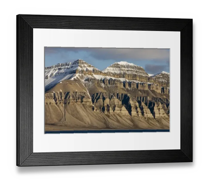 Framed Print : Norway, Svalbard, Spitsbergen Island, Setting midnight sun lights eroded cliffs