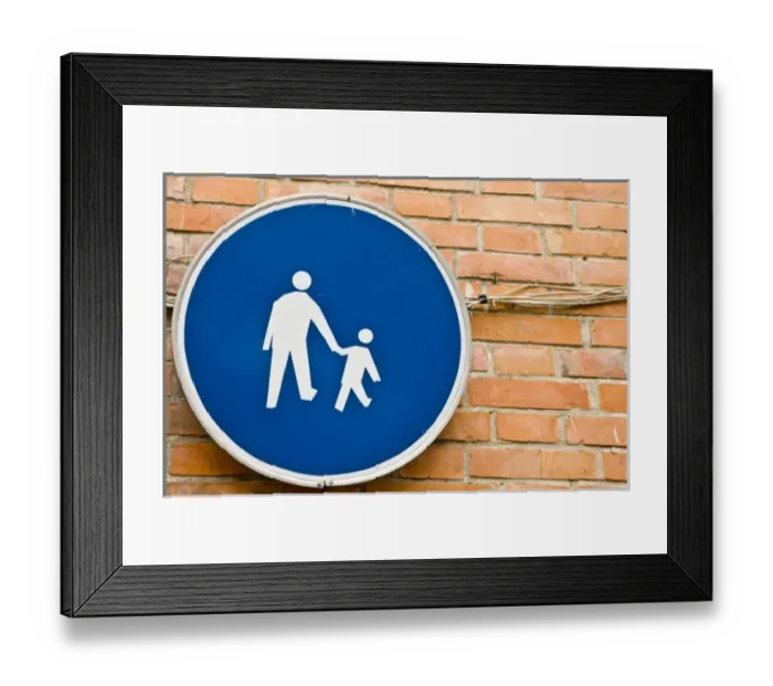 Framed Print : Poland, Gdansk. Universal signage on wall in Old Town