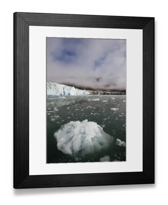 Framed Print : Norway, Svalbard, Spitsbergen Island, Small icebergs float near face of Hans Glacier Framed Print : Norway, Svalbard, Spitsbergen Island, Small icebergs float near face of Hans Glacier