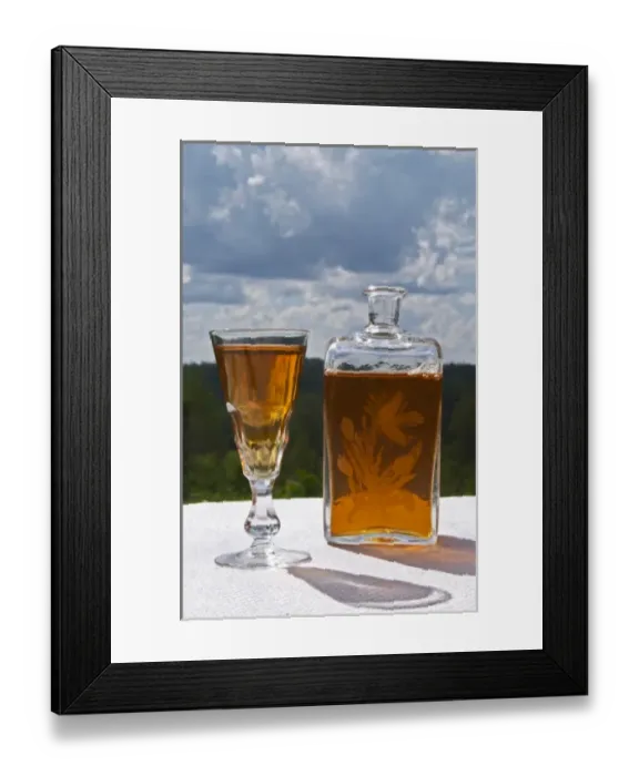 Framed Print : Swedish traditional aquavit schnapps glass filled to the brim with spiced vodka, brannvin Framed Print : Swedish traditional aquavit schnapps glass filled to the brim with spiced vodka, brannvin