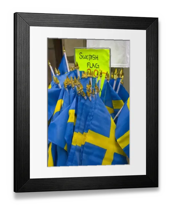 Framed Print : Sweden, Stockholm, Gamla Stan. Swedish flag souvenirs