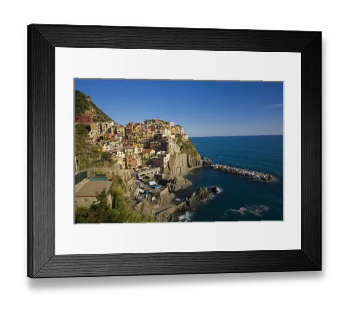 Framed Print : Italy, Cinque Terre, Manrola, Hillside Town of Manrola with the Mediterranen Sea Framed Print : Italy, Cinque Terre, Manrola, Hillside Town of Manrola with the Mediterranen Sea