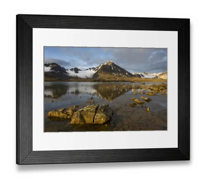 Framed Print : Norway, Svalbard, Spitsbergen, Rising midnight sun lights glacier-covered mountains