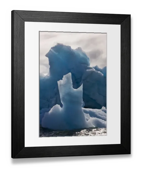 Framed Print : Norway, Svalbard, Nordaustlandet, Deep blue iceberg floating in Palanderbukta Bay
