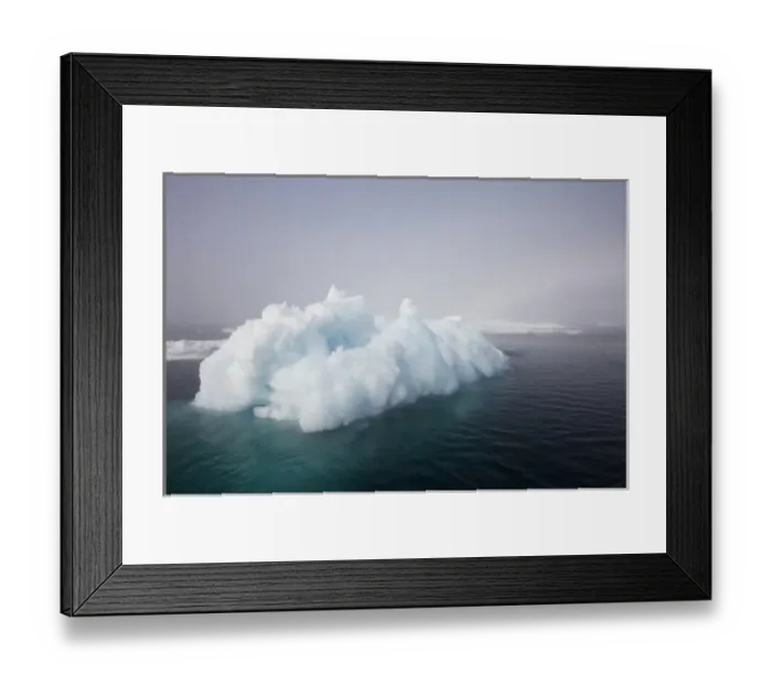 Framed Print : Norway, Svalbard, Iceberg floating in still sea in Storfjorden Fjord in Tusenoyane