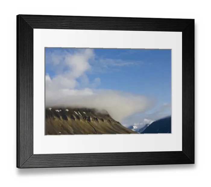 Framed Print : Norway, Svalbard, Spitsbergen Island, Setting sun lights clouds above eroded cliffs Framed Print : Norway, Svalbard, Spitsbergen Island, Setting sun lights clouds above eroded cliffs
