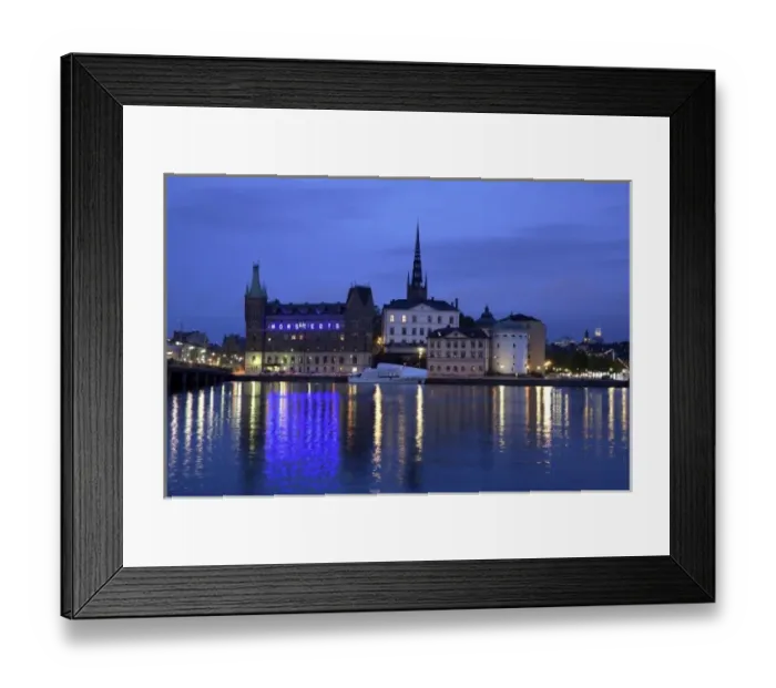 Framed Print : Sweden. Stockholm. The night view of Riddarholmen Island with the black spire of Riddarholmskyrkan