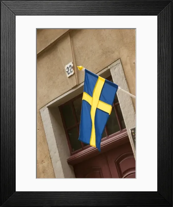 Framed Print : Sweden, Stockholm. Swedish flag over doorway in Gamla Stan (Old Town) Stockholm Framed Print : Sweden, Stockholm. Swedish flag over doorway in Gamla Stan (Old Town) Stockholm