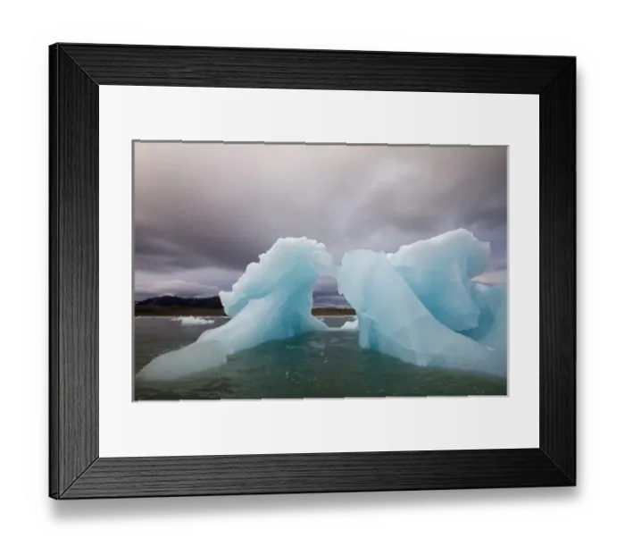 Framed Print : Norway, Svalbard, Spitsbergen Island, Blue arched iceberg floating near face of Sveabreen