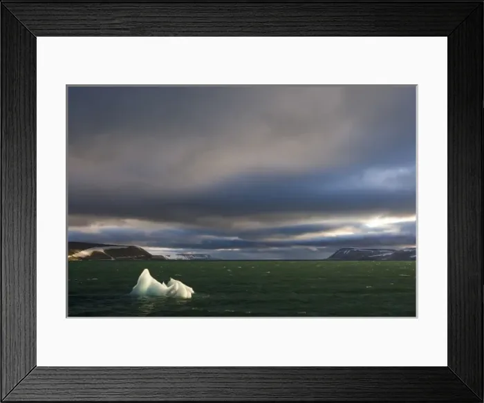 Framed Print : Norway, Svalbard, Nordaustlandet, Setting sun lights iceberg floating in Palanderbukta Framed Print : Norway, Svalbard, Nordaustlandet, Setting sun lights iceberg floating in Palanderbukta