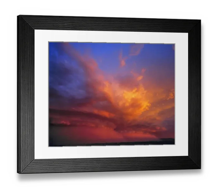 Framed Print : USA, Nevada. Storm clouds color with the setting sun over the Nevada desert